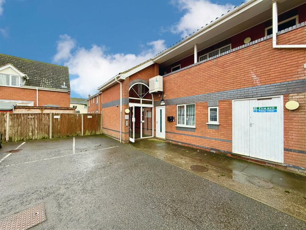 communal entrance and parking space