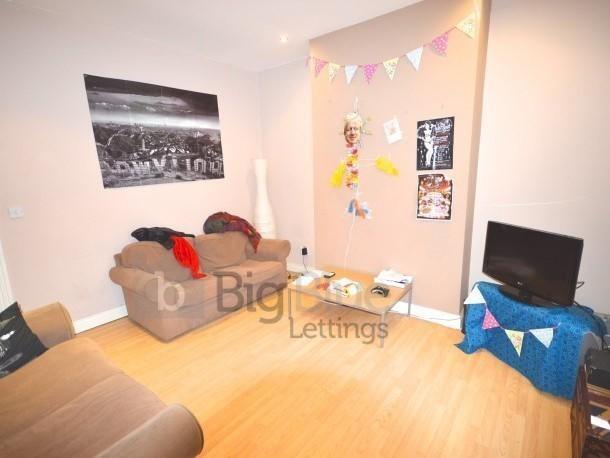 A cozy living room featuring comfortable seatin...