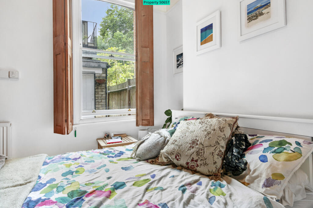 BEDROOM WOODEN WINDOW SHUTTERS