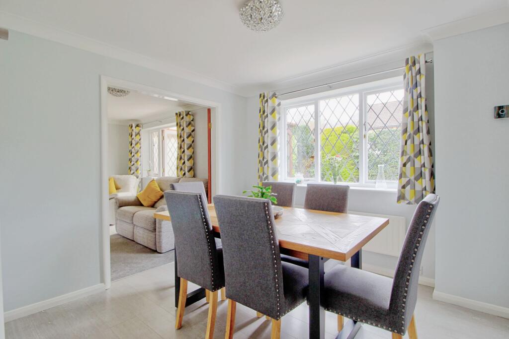 Double doors between dining &amp; living rooms