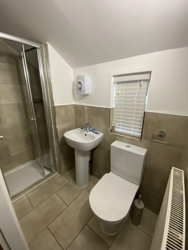A modern and well-maintained bathroom featuring...