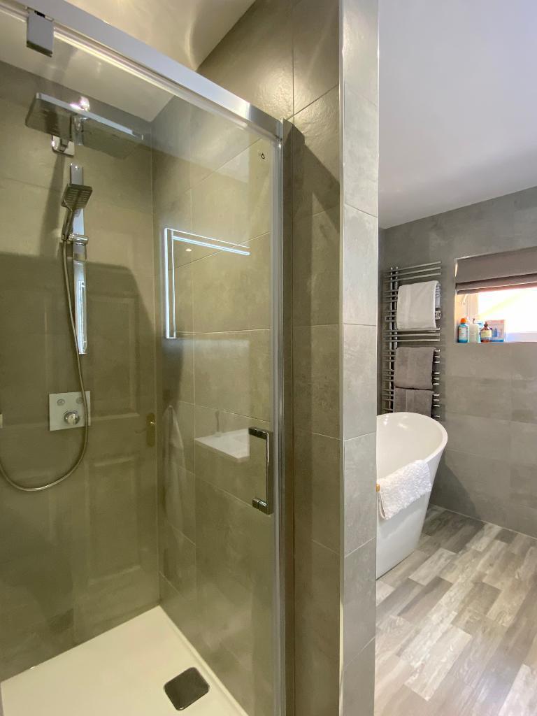 Family bathroom with bath &amp; shower