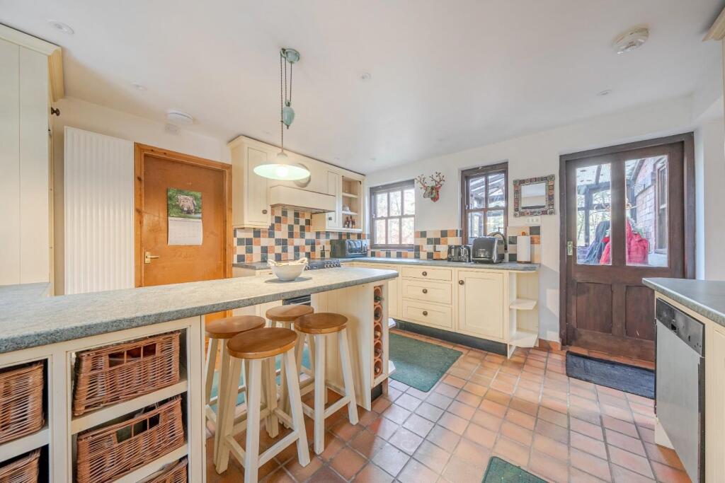 Kitchen with door to Porch.jpg