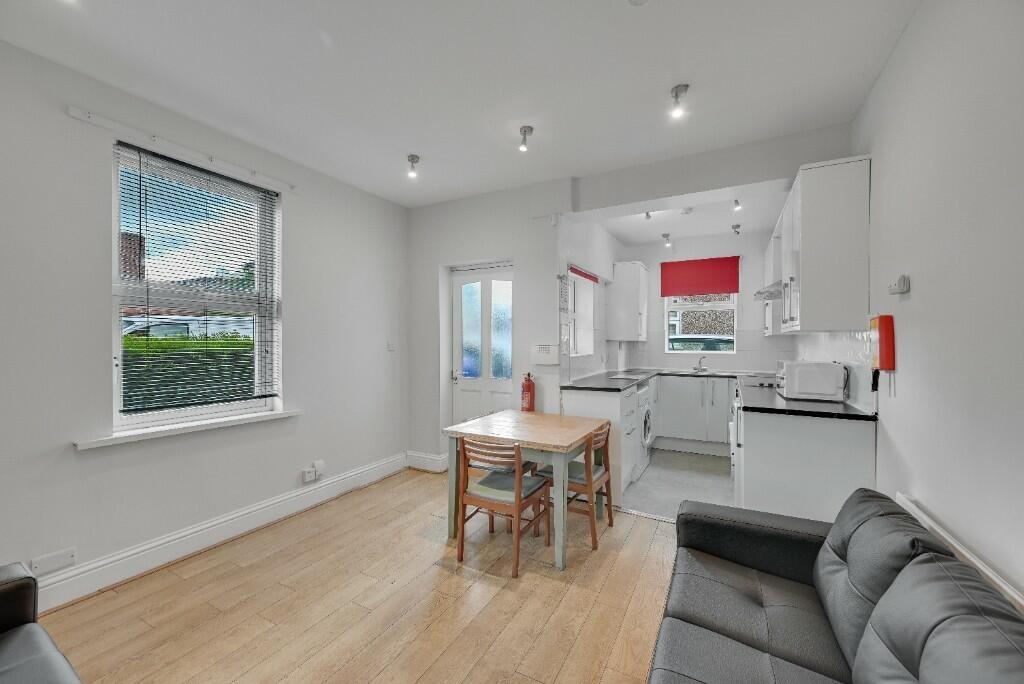 Bright and modern kitchen with natural light po...