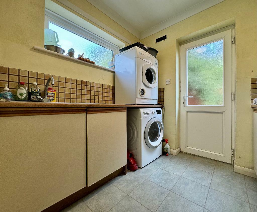Handy utility room, door to garden