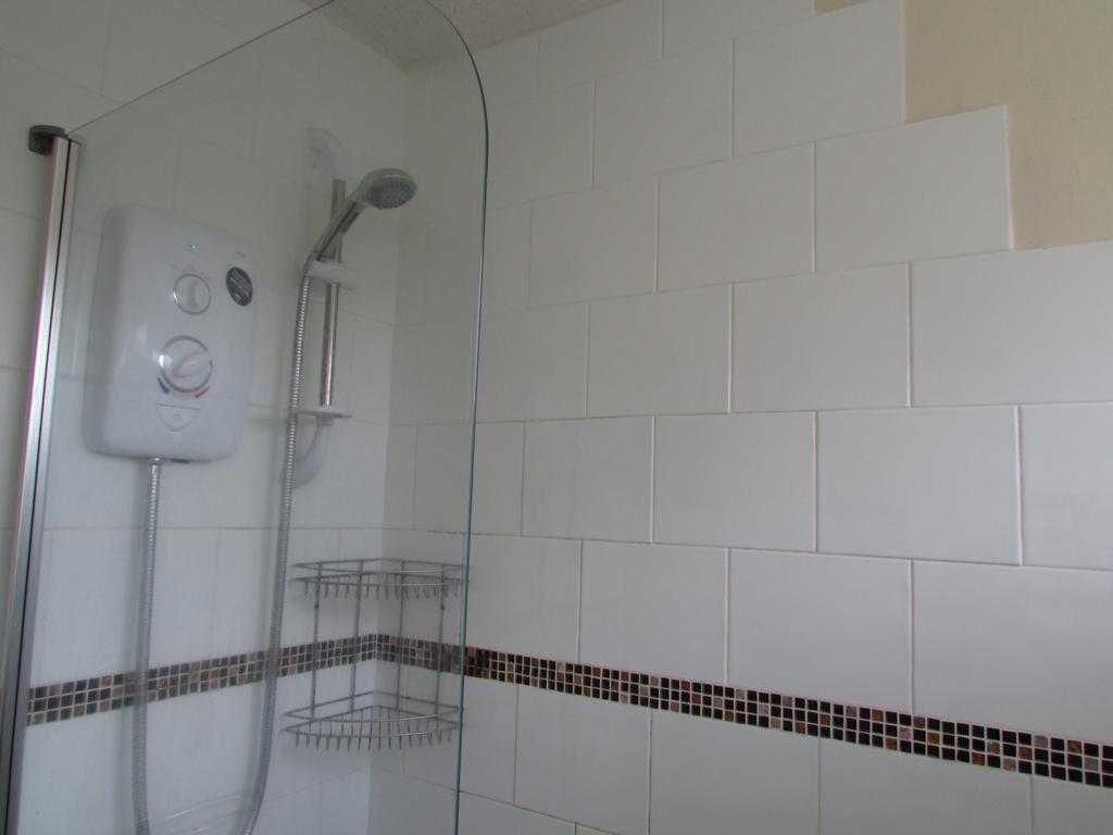 Shower over bath