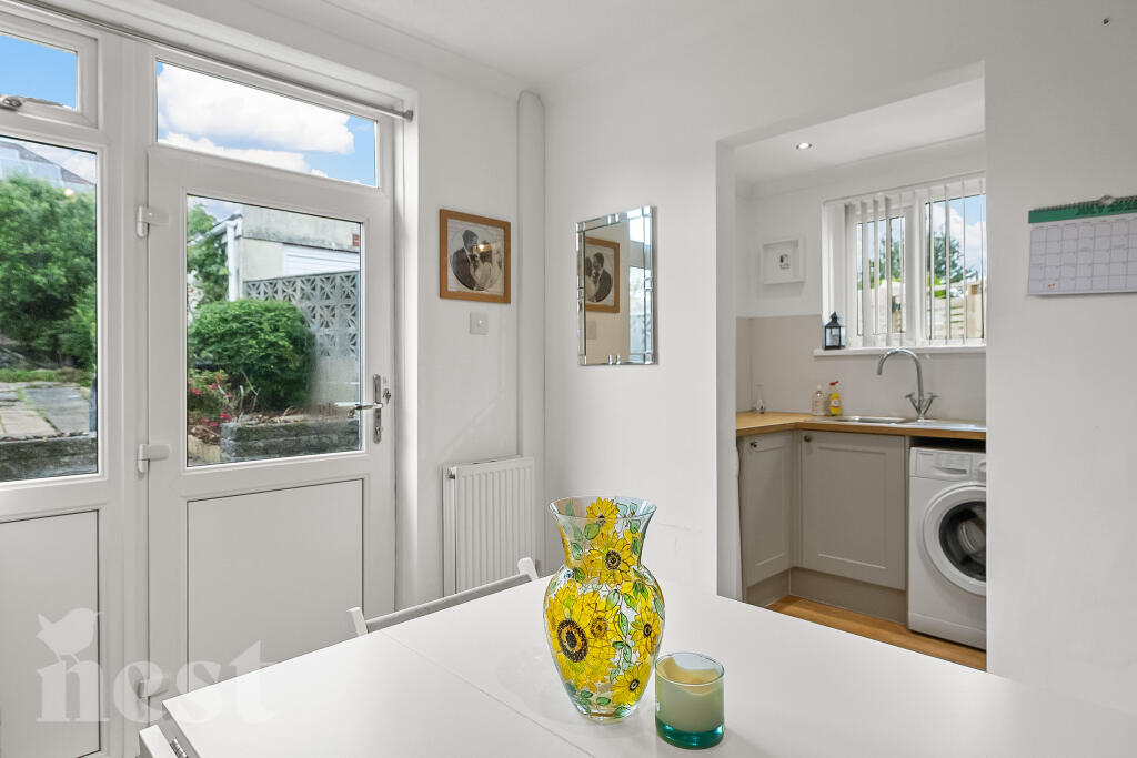 Kitchen through to Utility Room