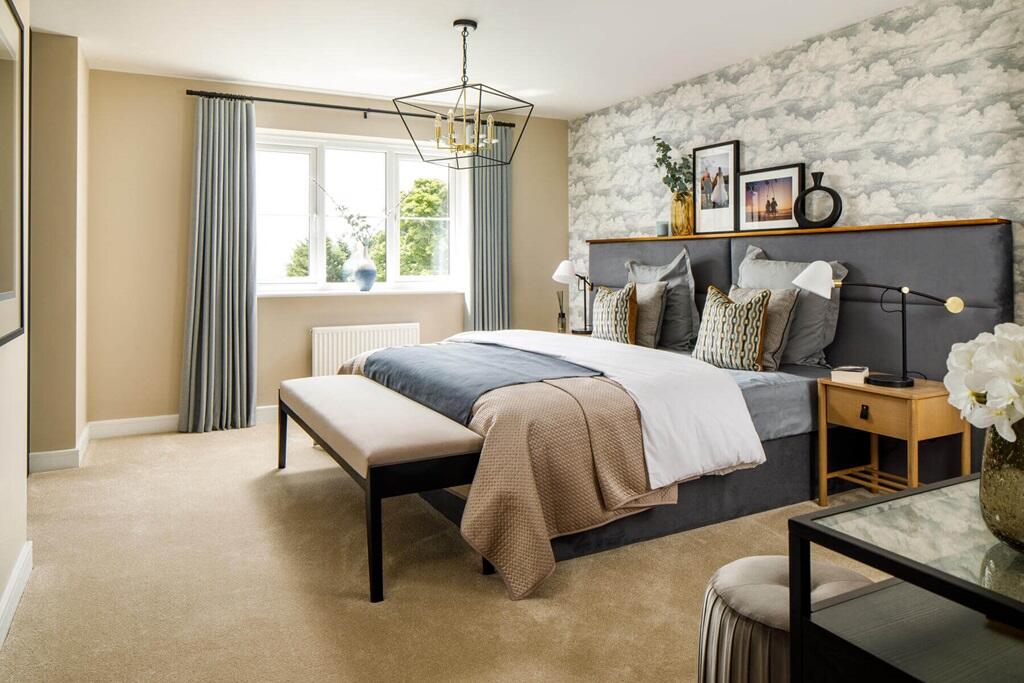 The spacious main bedroom of the Wortham is the perfect place to unwind