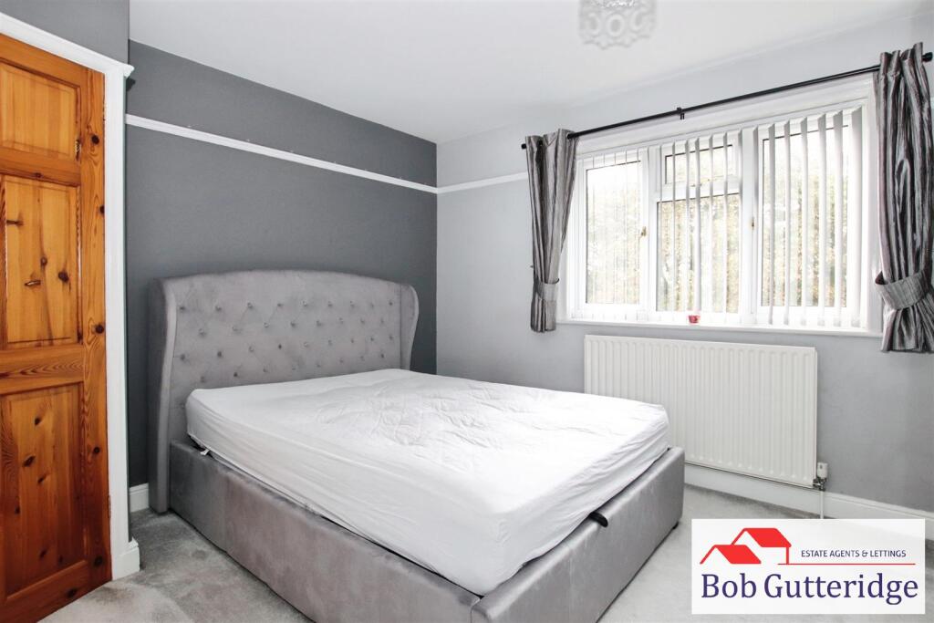 BEDROOM ONE (REAR)