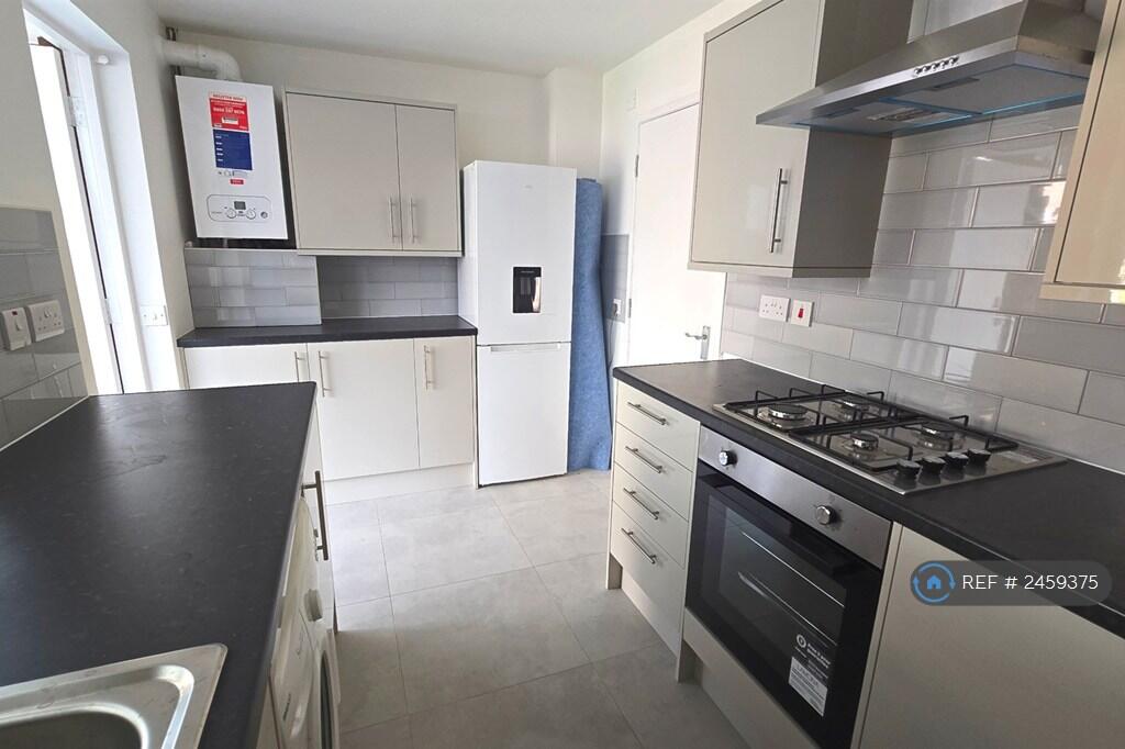 Kitchen Bolder And Fridge Freezer