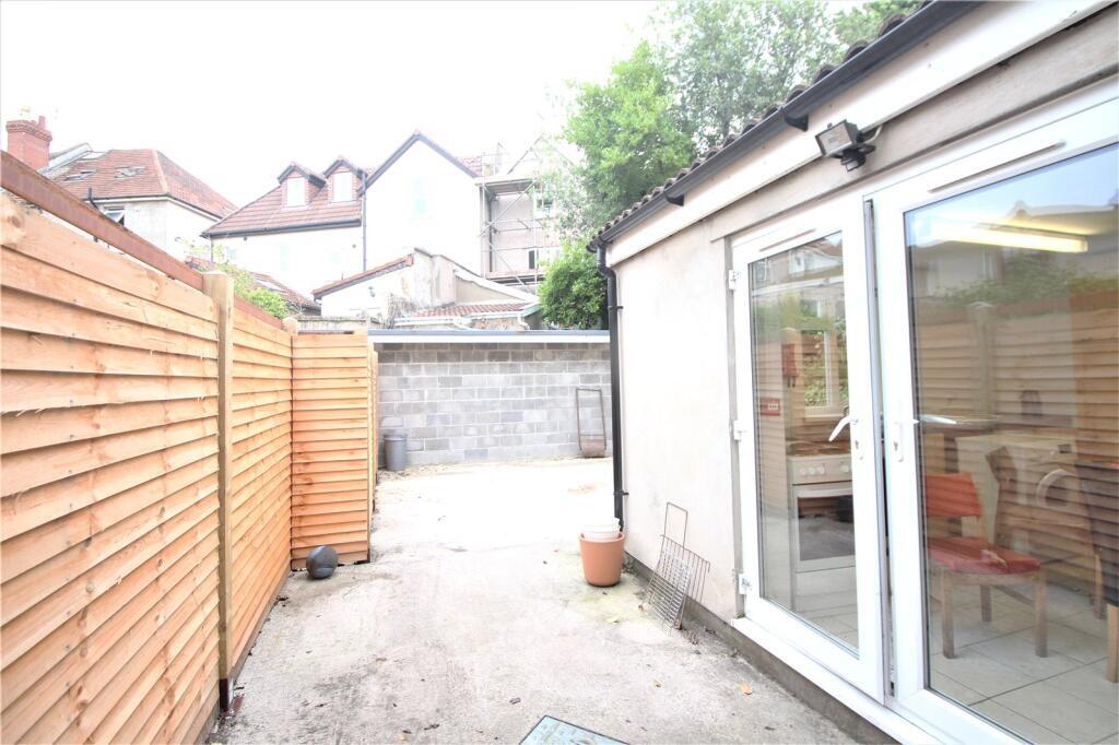 A bright and private outdoor garden space with ...