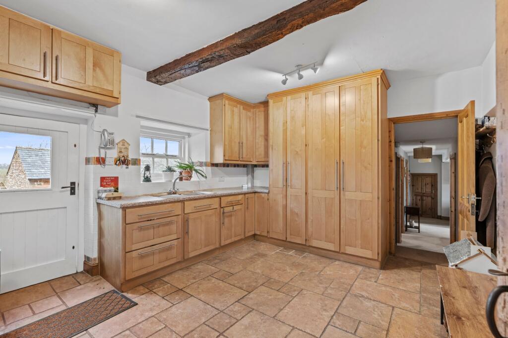 Utility Room - door leading through to Orchard Cottage