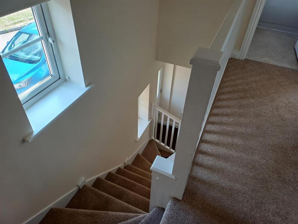 STAIRS AND FIRST FLOOR LANDING
