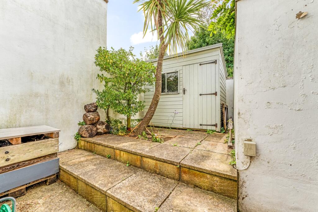 Rear garden to rear access and shed