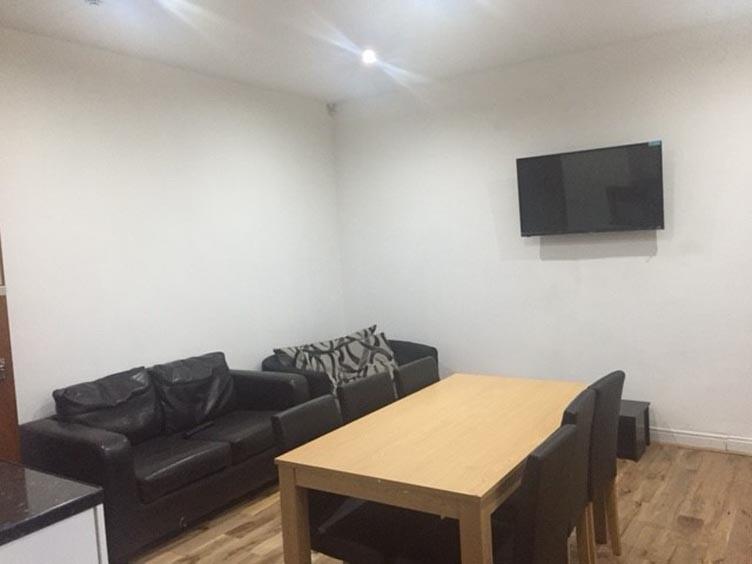 A spacious and well-maintained living room feat...