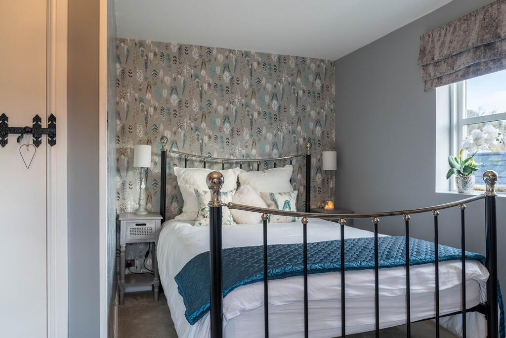 Bedroom 2 with dual aspect windows