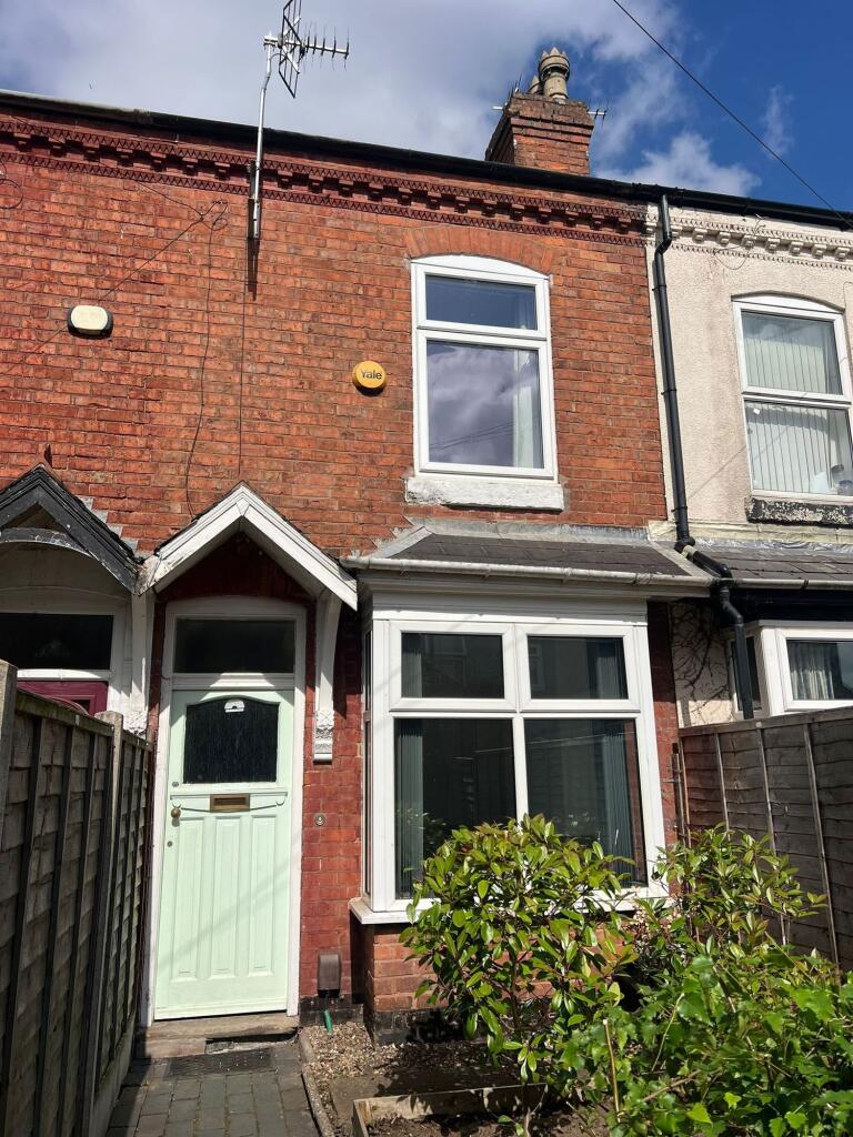 Charming terraced brick house with a welcoming ...