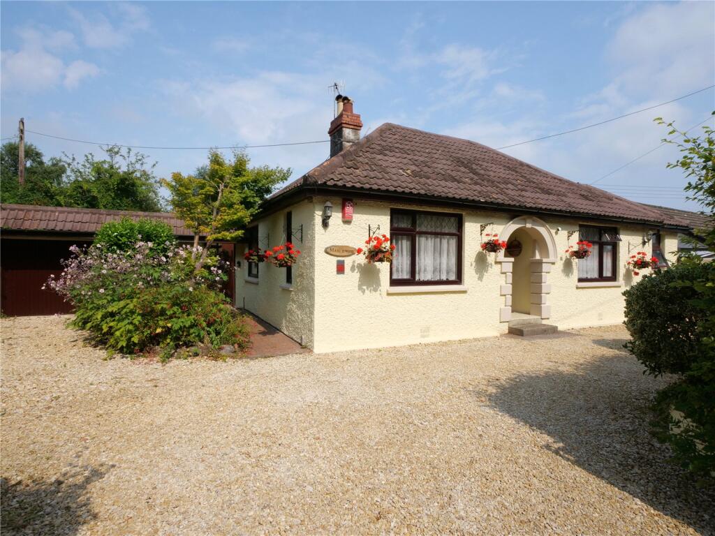 A spacious bungalow with large gardens and versatile living space.