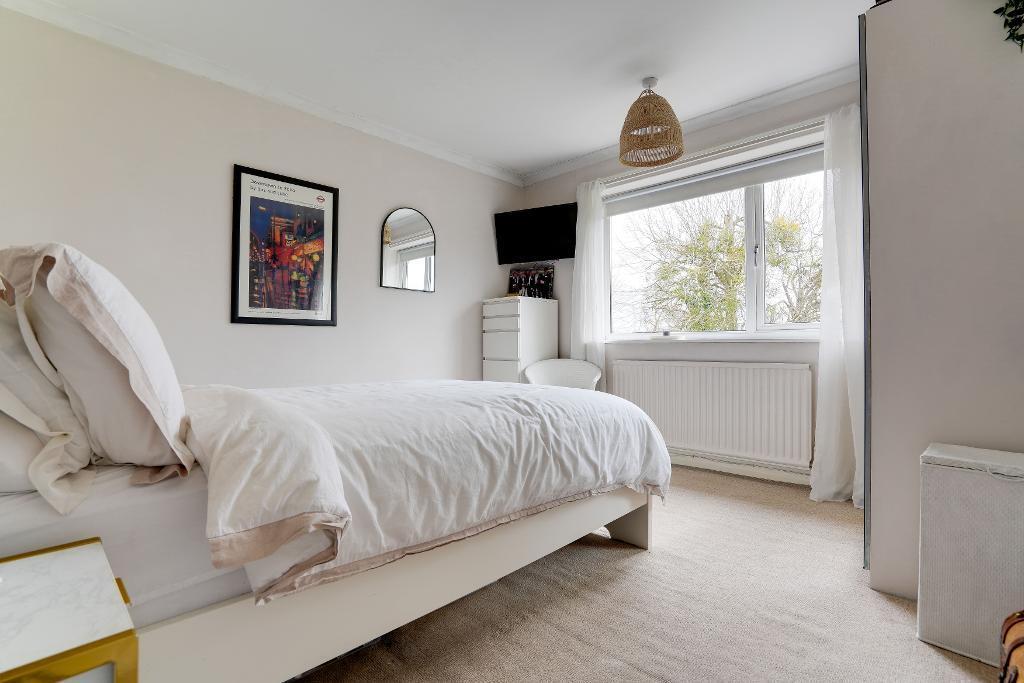 Bedroom 3 with garden views