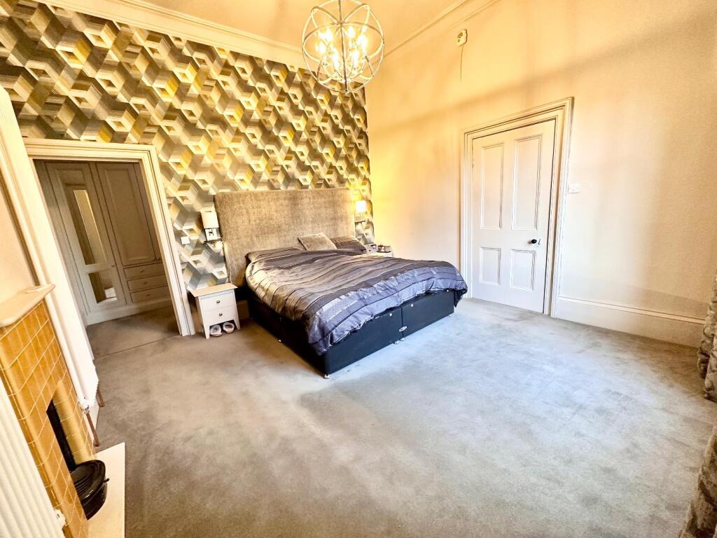 BEDROOM ONE AND ENSUITE