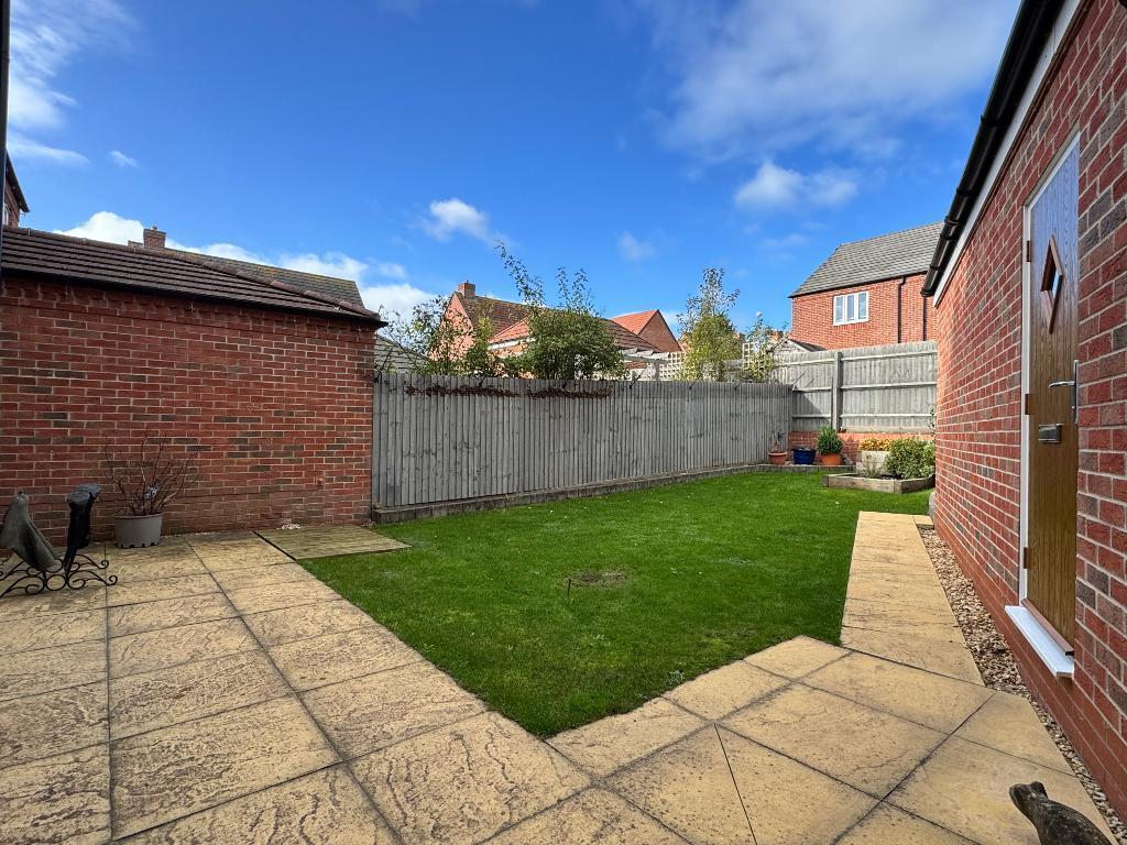 Low maintenance garden, door to garage