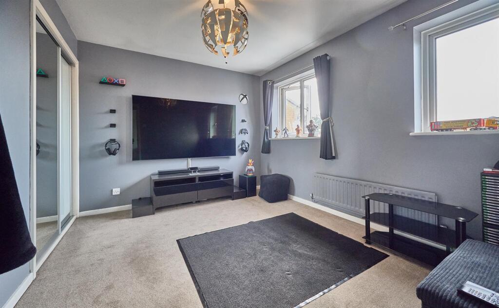 BEDROOM TWO TO REAR