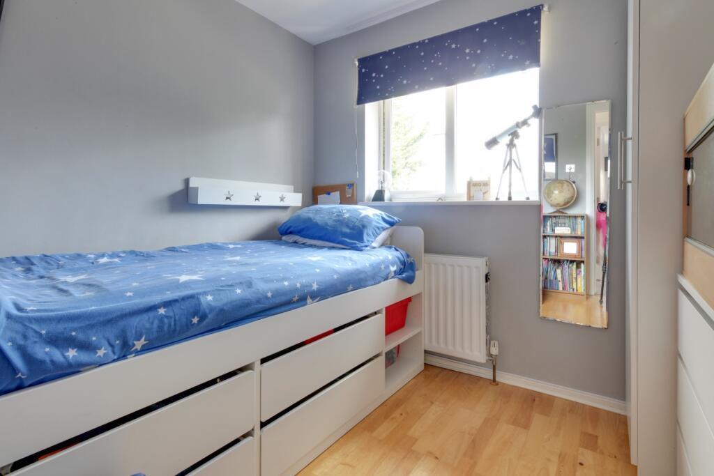 bedroom 2 to rear of house