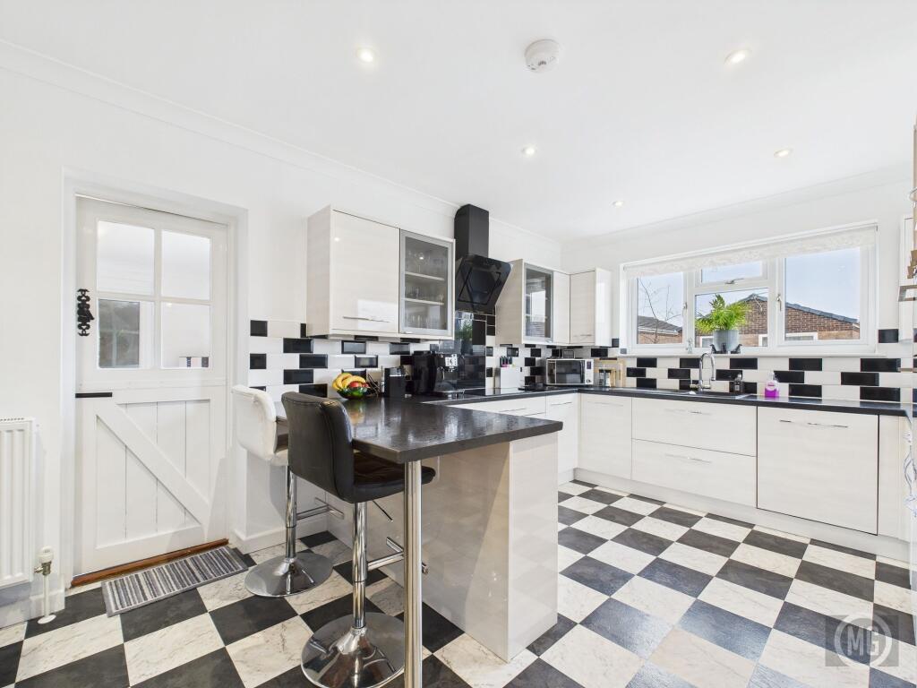 Kitchen leading into Utility