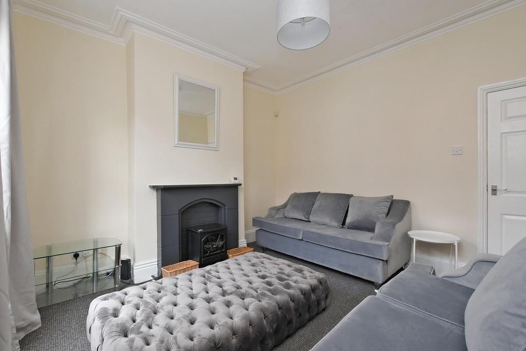 A contemporary living room featuring comfortabl...