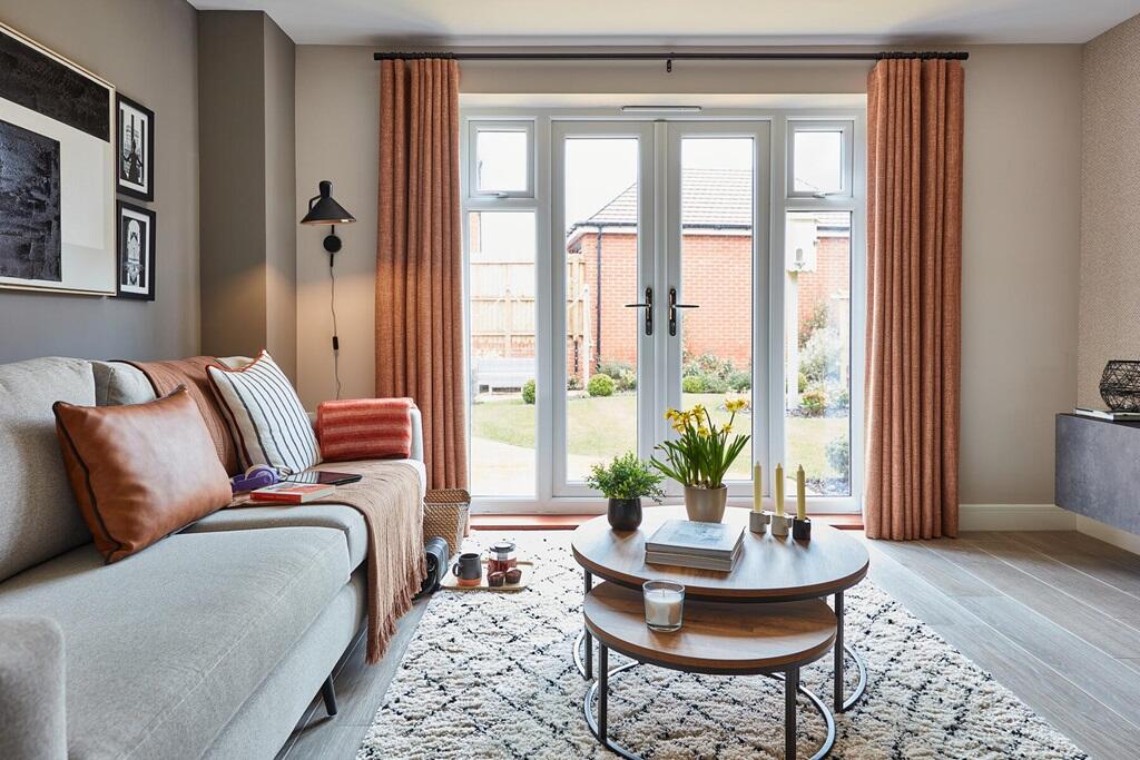 Double doors lead out to the garden from the lounge