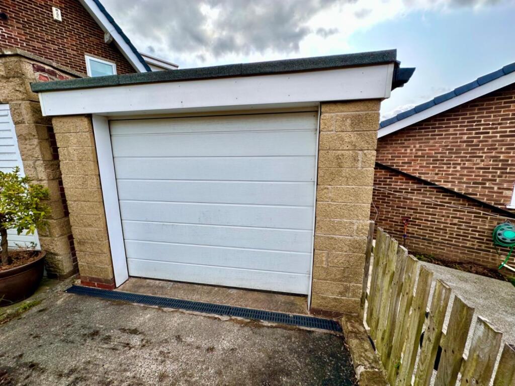 DETACHED GARAGE AND DRIVEWAY