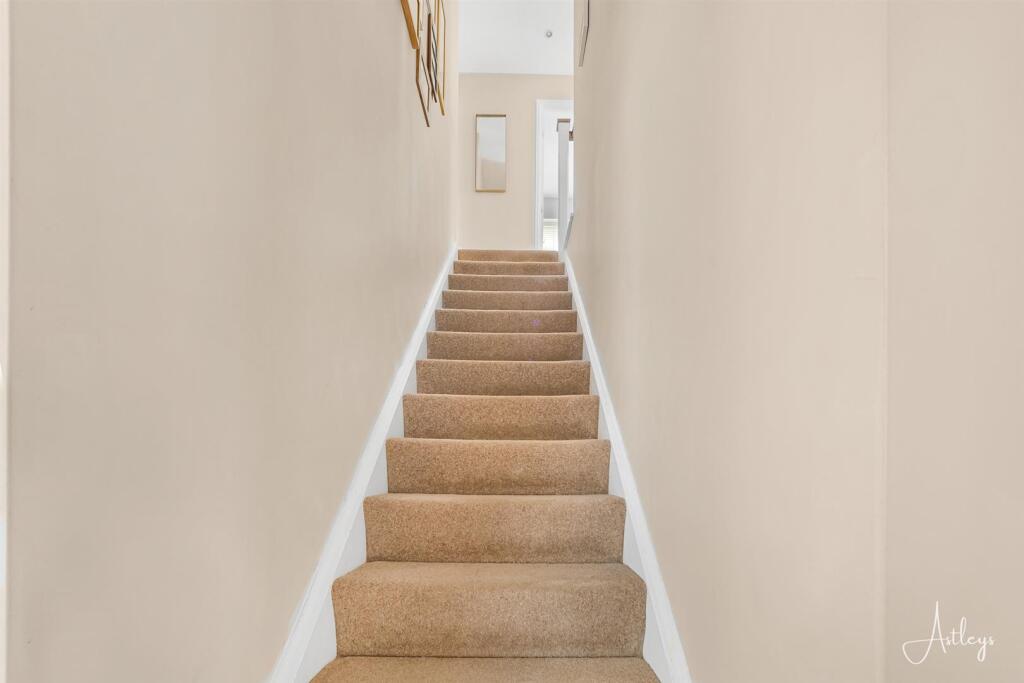 Stairs to first floor