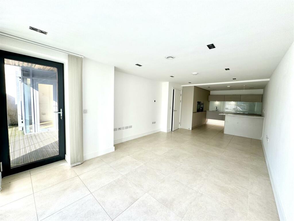 KITCHEN/DINING/LIVING ROOM