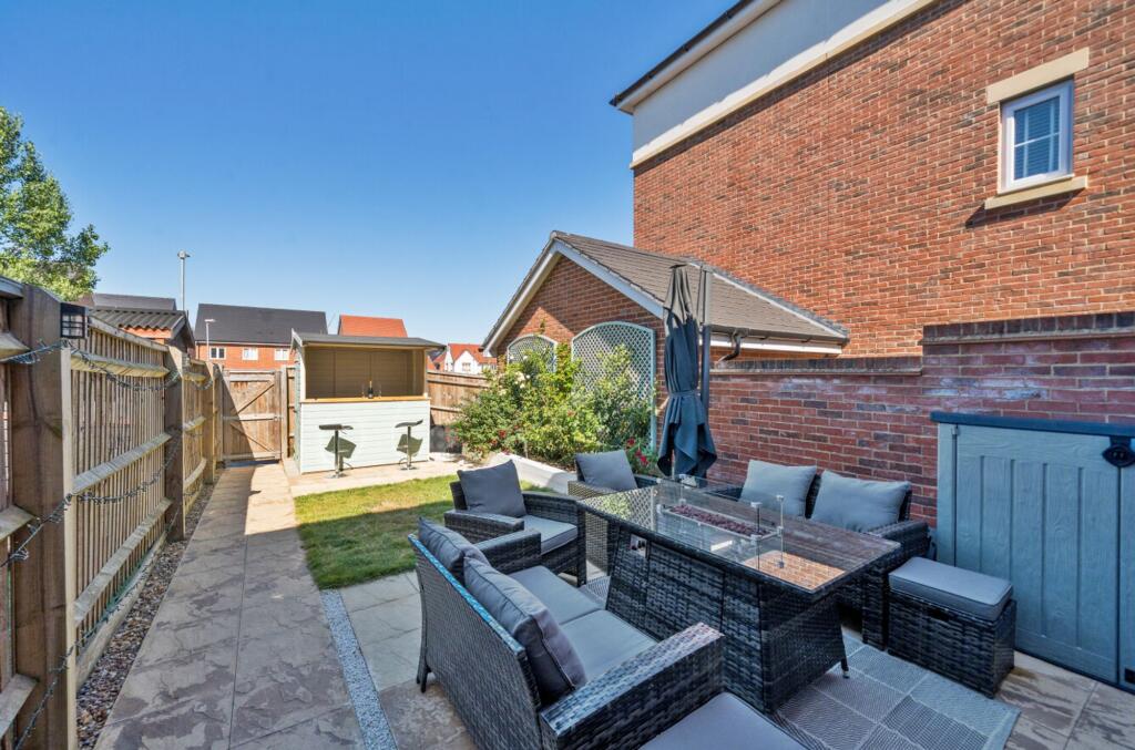 Landscaped rear garden with patio