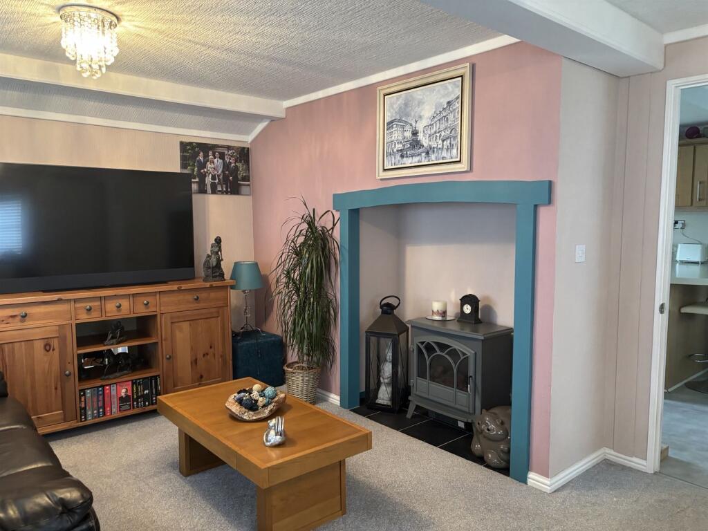 Lounge With Feature Fireplace