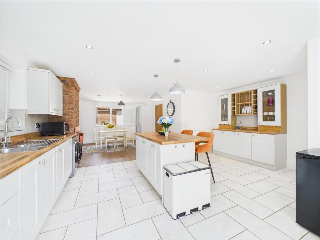 KITCHEN WITH DINING AREA
