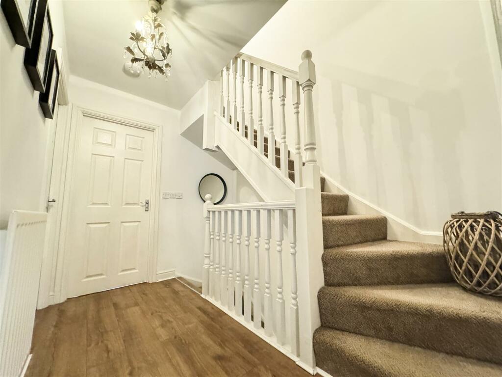 STAIRS TO THE FIRST FLOOR LANDING