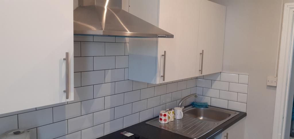 Kitchen showing extractor fan