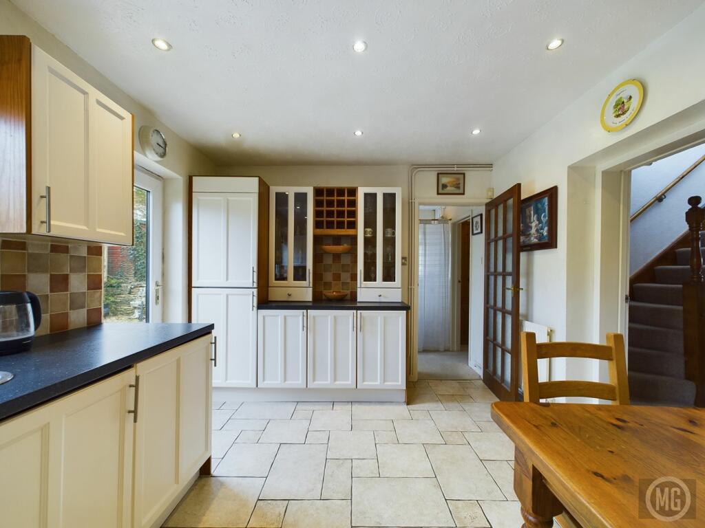 Kitchen leading into Rear Hallway