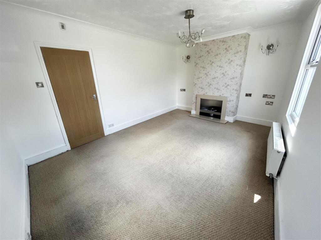 LIVING ROOM/ FOURTH BEDROOM