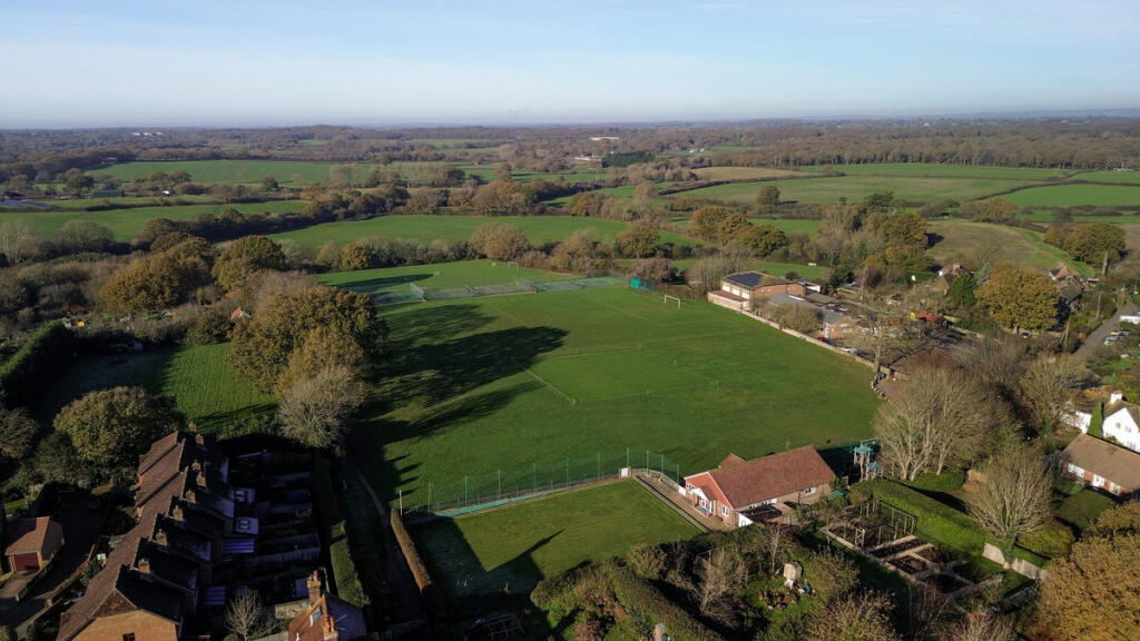 Aerial view over the Barcombe sports &amp; recreation ground and open countryside &amp; walks beyond