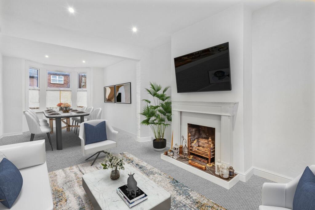 Disclaimer: This image has been virtually staged to illustrate potential layout and furnishings.