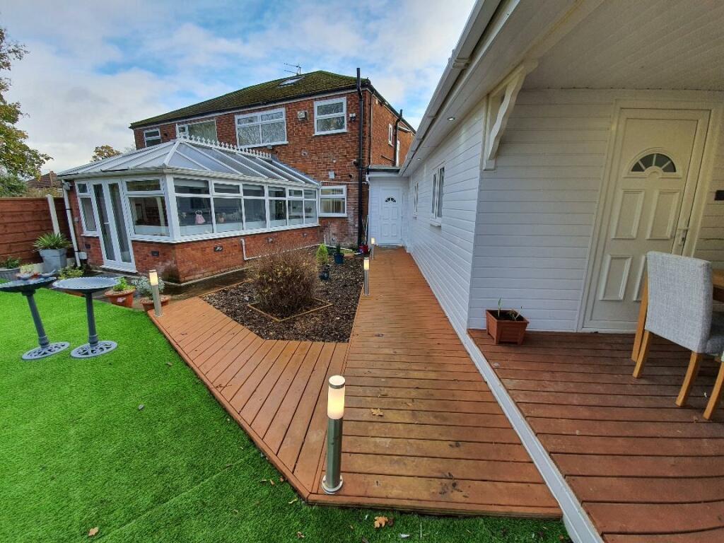 REAR SHOWING SEATING AREA