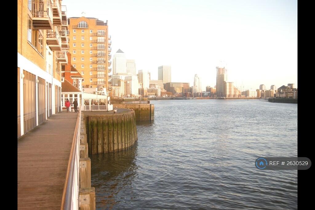 Close Walk To Canary Wharf Along Narrow Street
