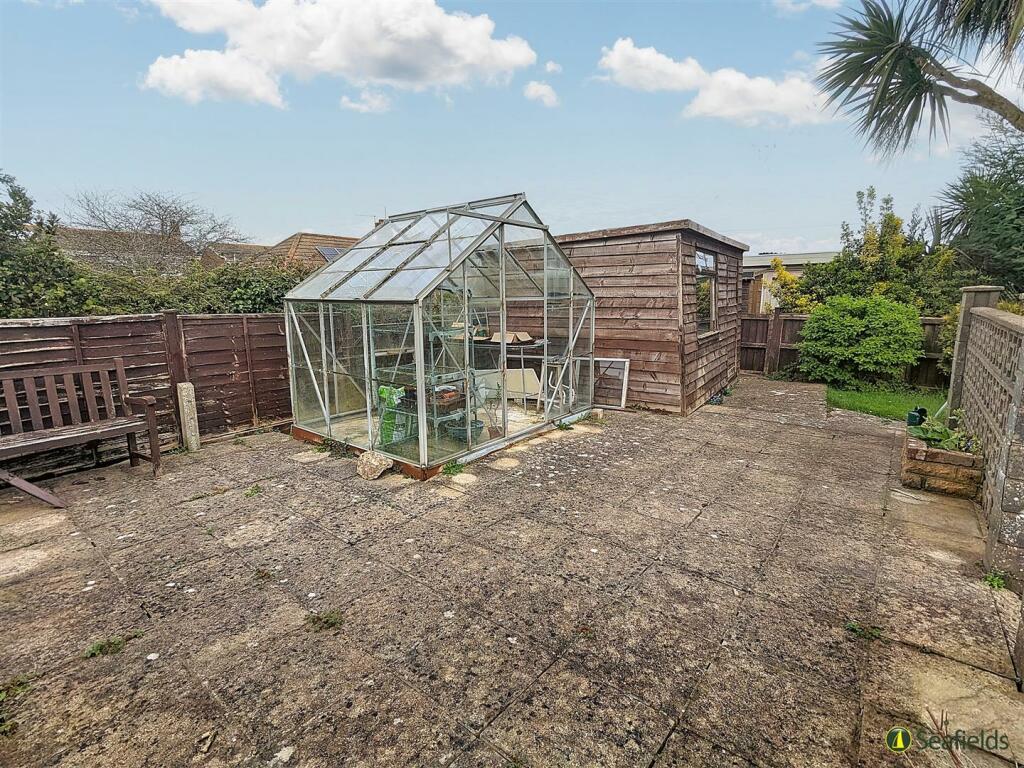 Patio and Greenhouse