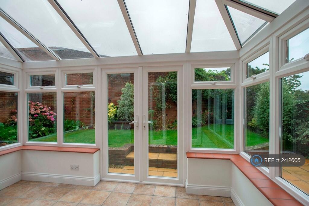 Inside Conservatory Onto The Garden