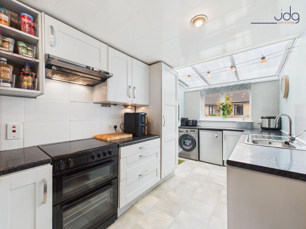 Modern shaker-style kitchen and Velux windows