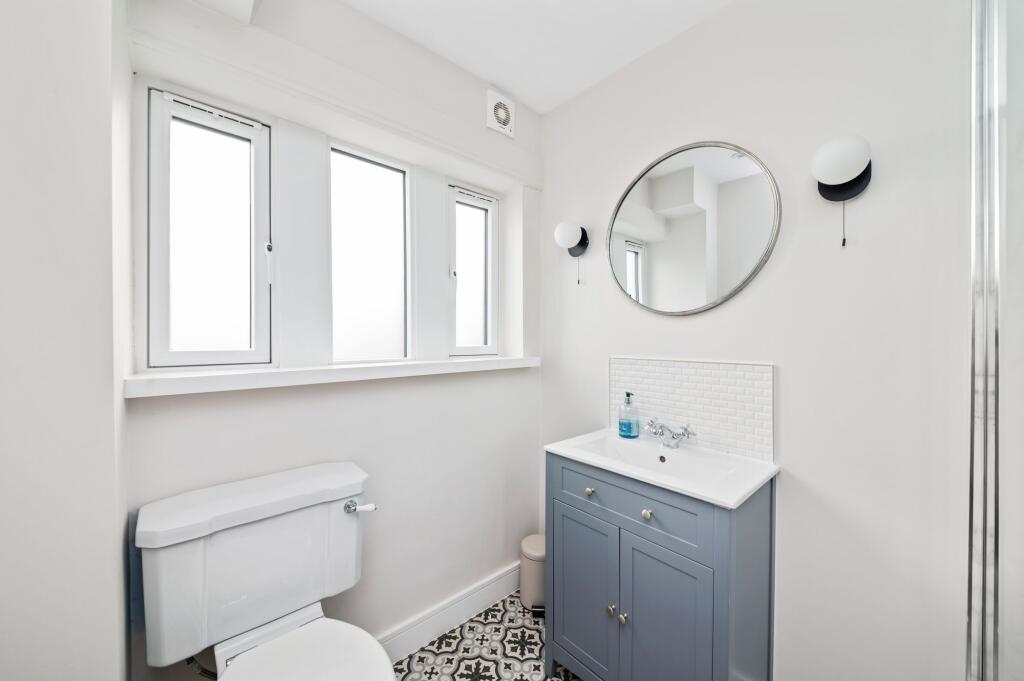 BEDROOM ONE EN-SUITE SHOWER ROOM