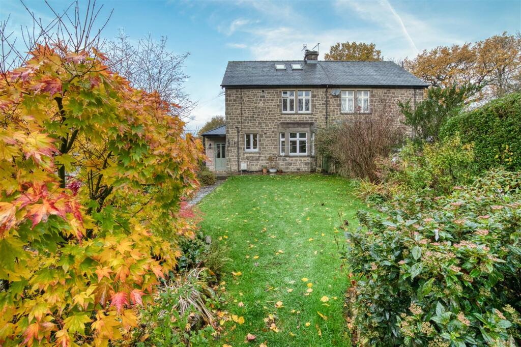 Rear of the home and lawn.jpg