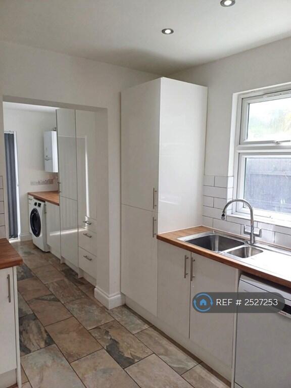 Kitchen Through Utility Area